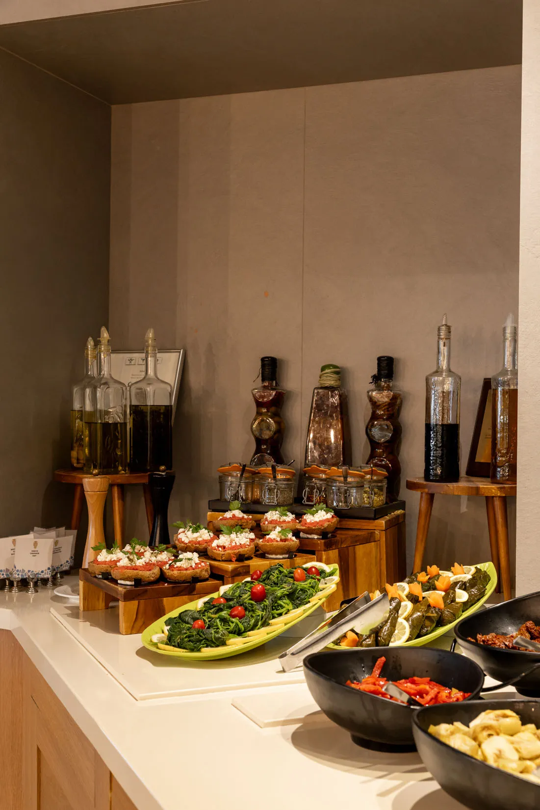 Cretan gastronomy, restaurant buffet dishes and cocktail lounge at Nefeli Hotel